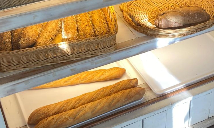 Freshly baked baguettes and seeded rolls