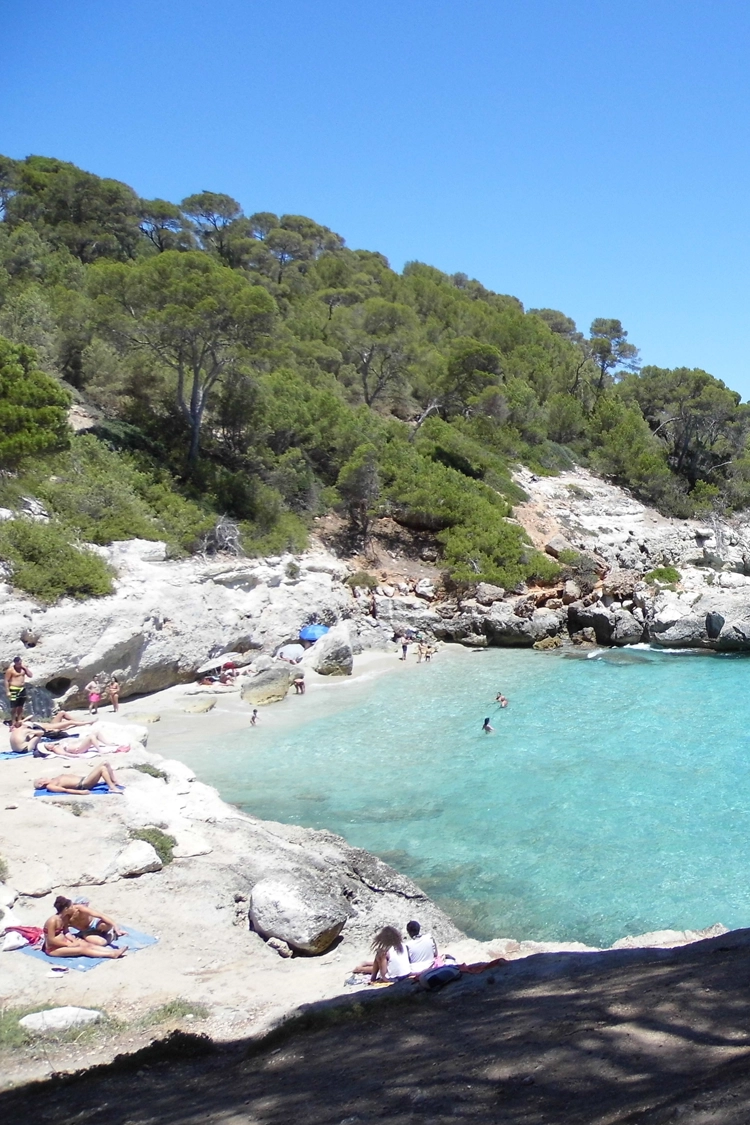 Clear turquoise waters at Cala Mitjaneta